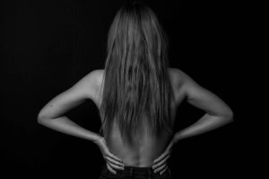black and white body image from behind