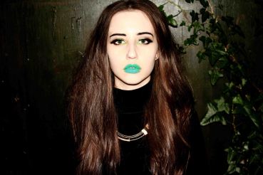 Portrait of Beats with leaves in the background