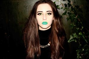 Portrait of Beats with leaves in the background