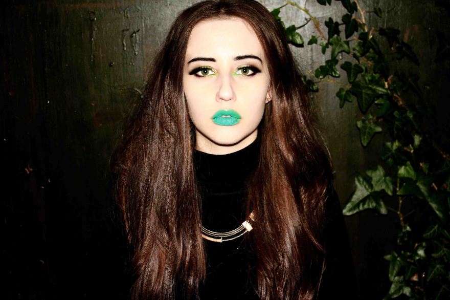 Portrait of Beats with leaves in the background