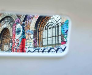 Graffiti with windows through a white frame