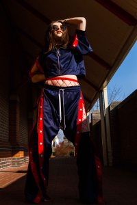 Natural light full length portrait of model in a tunnel