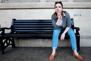 hipster portrait of model on a bench