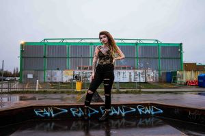 model with dreadlocks portrait in skatepark