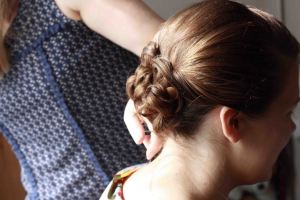 bridesmaid having her hair done