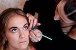bridesmaid having her make up done
