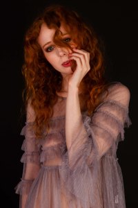 Portrait of ginger model in studio